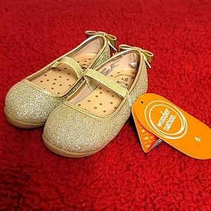 Wonder nation infant shoes size 6. Color gold. NWT